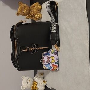 Elegant Black Crossbody Bag with Gold Accents & Butterfly Coin Purse